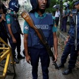 Policemen stand guard along a road leading to the Holey Artisan Bakery and the O'Kitchen Restaurant after gunmen attacked, in Dhaka, Bangladesh, July 3, 2016. REUTERS/Adnan Abidi/File Photo