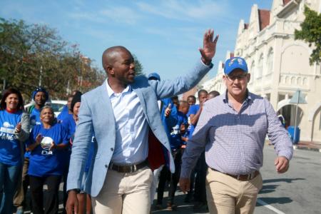 Democratic Alliance leader (D.A), Mmusi Maimane (L) and the mayoral candidate for Nelson Mandela Bay, Athol Trollip wave to their suppoters during their election campaign in Port Elizabeth, August 2,2016. Picture taken August 2, 2016. REUTERS/Luvuyo Mehlwana