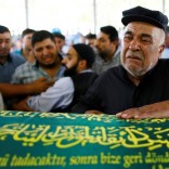 Relatives of Kumri Ilter, one of the victims of Saturday's suicide bombing at a wedding, mourn during her funeral ceremony in southeastern city of Gaziantep, Turkey, August 22, 2016. REUTERS/Osman Orsal.