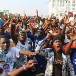 Supporters of Edgar Lungu, leader of the Patriotic Front party (PF), celebrate after Lungu narrowly won re-election on Monday, in a vote his main rival Hakainde Hichilema rejected on claims of alleged rigging by the electoral commission, in the capital, Lusaka, Zambia, August 15, 2016. REUTERS/Jean Serge Mandela