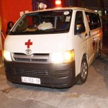 Ambulancia que transporta Catia Halar, lesionada, abandona pavilhão do Maxaquene rumo ao hospital. Costa do Marfim vs Mocambique (41-56). Afrobasket. Maputo, 24 de setembro de 2013. Sergio Costa/ASF