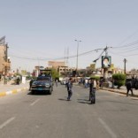 Iraqi security forces gather at the site of a suicide bomb blast in Baghdad al-Jadida, Iraq September 27, 2016. REUTERS/Ahmed Saad