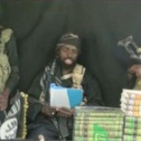 The purported leader of Nigerian Islamist militant group Boko Haram Abubakar Shekau appears at an unknown location in a still image taken from an undated video posted on social media on September 25, 2016. Social media/Handout via Reuters TV