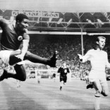 (FILES) -- A file handout picture taken on May 22, 1963 and released by Central Press shows Football legend and former Portugal's national team player Eusebio da Silva Ferreira (L) kicking the ball during a soccer match between Milan AC and Benfica for the European Cup in Wembley. Eusebio, who was the 1965 European Footballer of the Year and considered one of the best footballers of all time and best ever from Portugal, died at age 71 on January 5, 2014. AFP PHOTO / CENTRAL PRESS RESTRICTED TO EDITORIAL USE - MANDATORY CREDIT "AFP PHOTO / CENTRAL PRESS" - NO MARKETING NO ADVERTISING CAMPAIGNS - DISTRIBUTED AS A SERVICE TO CLIENTS-/AFP/Getty Images