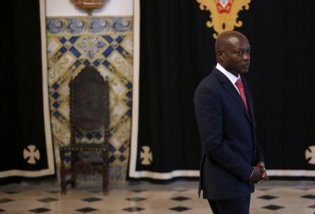 Guinea-Bissau's President Jose Mario Vaz arrives to speak with journalists after a meeting with his Portuguese counterpart Anibal Cavaco Silva (not pictured) at Belem presidential palace in Lisbon June 19, 2014. REUTERS/Rafael Marchante