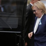 U.S. Democratic presidential candidate Hillary Clinton climbs into her van outside her daughter Chelsea's home in New York, New York, United States September 11, 2016, after Clinton left ceremonies commemorating the 15th anniversary of the September 11 attacks feeling "overheated."  REUTERS/Brian Snyder