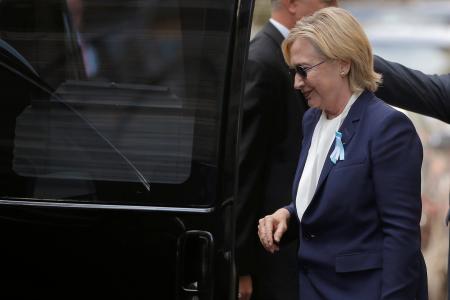 U.S. Democratic presidential candidate Hillary Clinton climbs into her van outside her daughter Chelsea's home in New York, New York, United States September 11, 2016, after Clinton left ceremonies commemorating the 15th anniversary of the September 11 attacks feeling "overheated."  REUTERS/Brian Snyder