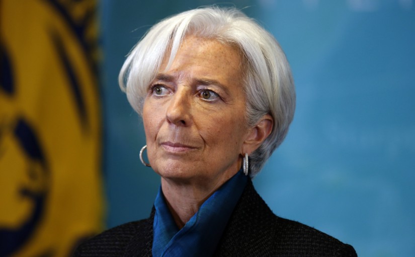 International Monetary Fund (IMF) Managing Director Christine Lagarde, waits to greet British Prime Minister David Cameron, before a round table meeting at the IMF, Thursday, Jan. 15, 2015 in Washington. (AP Photo/Alex Brandon)
