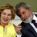 Brazil's President Luiz Inacio Lula da Silva talks with his wife Marisa Leticia during a ceremony at Planalto Palace in Brasilia, June 26, 2007. REUTERS/Jamil Bittar/File Photo