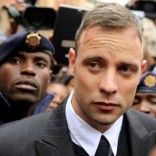 Olympic and Paralympic track star Oscar Pistorius leaves court after appearing for the 2013 killing of his girlfriend Reeva Steenkamp in the North Gauteng High Court in Pretoria, South Africa, June 14, 2016. REUTERS/Siphiwe Sibeko/Files