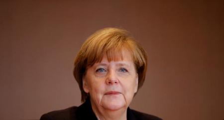 German Chancellor Angela Merkel attends the weekly cabinet meeting at the Chancellery in Berlin, Germany December 1, 2015. REUTERS/Fabrizio Bensch/File Photo
