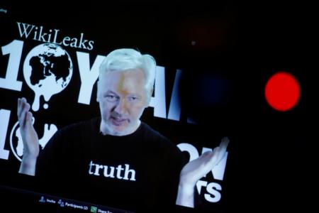 Julian Assange, Founder and Editor-in-Chief of WikiLeaks speaks via video link during a press conference on the occasion of the ten year anniversary celebration of WikiLeaks in Berlin, Germany, October 4, 2016.    REUTERS/Axel Schmidt