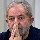 Former Brazilian President (2003-2011) Luiz Inacio Lula da Silva gestures during a meeting with the Workers' Party (PT) members in Sao Paulo, Brazil on March 30, 2015 AFP PHOTO / Nelson ALMEIDA        (Photo credit should read NELSON ALMEIDA/AFP/Getty Images)