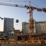 Cranes are seen at a construction site in Sandton outside Johannesburg, South Africa June 7,2016. REUTERS/Siphiwe Sibeko