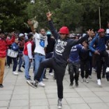 Students chant slogans during clashes with the South African police protect at Johannesburg's University of the Witwatersrand, South Africa, October 4, 2016. REUTERS/Siphiwe Sibeko