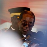 Zimbabwe's President Robert Mugabe attends the burial of National Hero Charles Utete at the Heroes Acre in Harare, Zimbabwe, July 19, 2016. REUTERS/Philimon Bulawayo