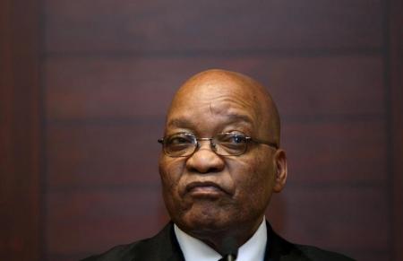 South African President Jacob Zuma listens at a news conference in Cape Town, in this September 10, 2009 file photo. REUTERS/Mike Hutchings/Files - RTX2A6BE
