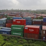 Cargo containers are seen stacked outside the container terminal of Jawaharlal Nehru Port Trust (JNPT) in Mumbai, July 15, 2015. REUTERS/Shailesh Andrade/Files