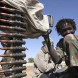 A child soldier from one of the many rebel groups operating along the Chad-Sudan border,  file. REUTERS/Emmanuel Braun