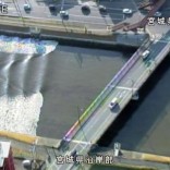 A tidal surge is seen in Sunaoshi River after tsunami advisories were issued following an earthquake in Tagajo, Miyagi prefecture, Japan November 22, 2016, in this video grab image released by Miyagi Prefectural Police via Kyodo. Mandatory credit Miyagi Prefectural Police/Kyodo/via REUTERS