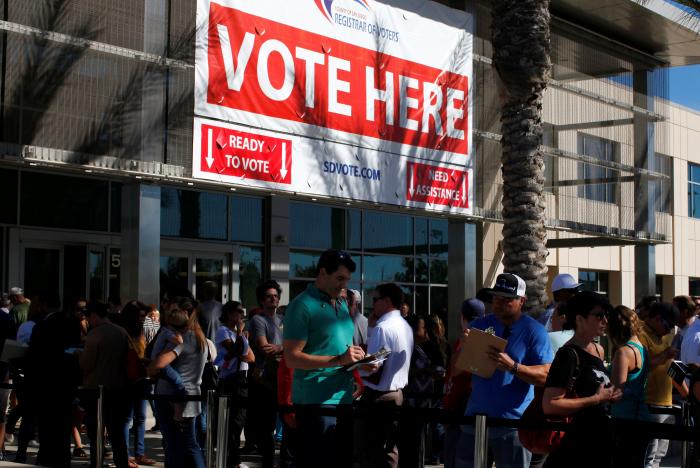 People line up to vote early outside the San Diego County Elections Office in San Diego, California, U.S., November 7, 2016.       REUTERS/Mike Blake