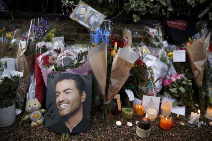 Tributes to singer George Michael are displayed outside of his home in north London, Britain December 27, 2016.  REUTERS/Neil Hall