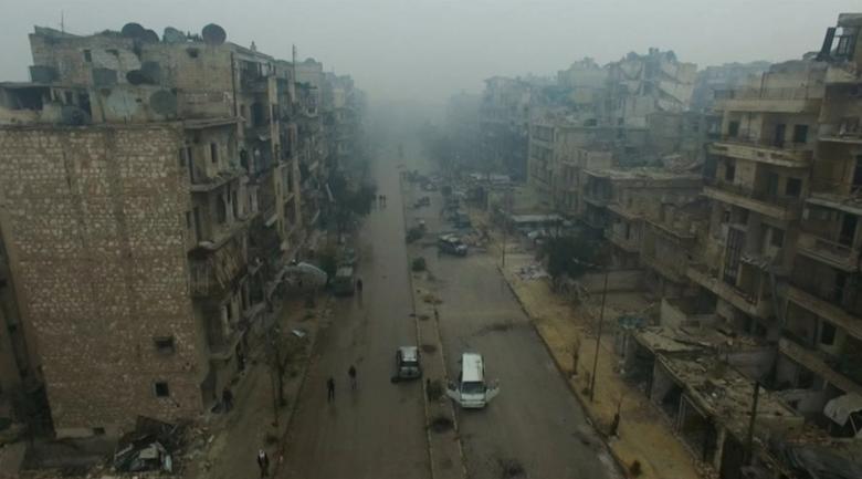 A still image from video taken December 13, 2016 of a general view of bomb damaged eastern Aleppo, Syria in the rain. REUTERS/via ReutersTV
