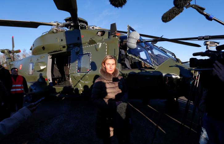 European Union foreign policy chief Federica Mogherini (C) talks to reporters during the Black Blade military exercise involving several European Union countries and organised by the European Defence Agency, at Florennes airbase, Belgium November 30, 2016.  REUTERS/Yves Herman