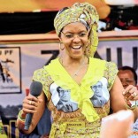 23122015
Zimbabwe's First Lady Grace Mugabe dances at a rally in Harare, Thursday, Nov. 19. 2015. Zimbabwe s first lady, repeatedly criticized for her lavish shopping sprees, told her supporters on Thursday that she now skips meals in solidarity with thousands of Zimbabweans facing hunger. At a rally held in a poor neighborhood in the capital Harare, Grace Mugabe told supporters she was skipping some of her meals to empathize with Zimbabweans who could only afford to have one meal a day. The first lady also dismissed claims that she plans to succeed her husband when his term ends in 2018. (AP Photo/Tsvangirayi Mukwazhi)