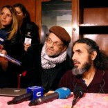 Former Guantanamo detainee Jihad Diyab (R) from Syria answers media questions during a news conference, while on a hunger strike, in Montevideo, Uruguay September 30, 2016. REUTERS/Andres Stapff