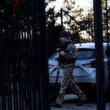 A guard screens cars entering the Russian embassy on Wisconsin Avenue in Washington, U.S. December 29, 2016. REUTERS/James Lawler Duggan