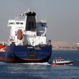 A cargo ship passes through the New Suez Canal, in Ismailia, Egypt, January 17, 2016. REUTERS/Mohamed Abd El Ghany