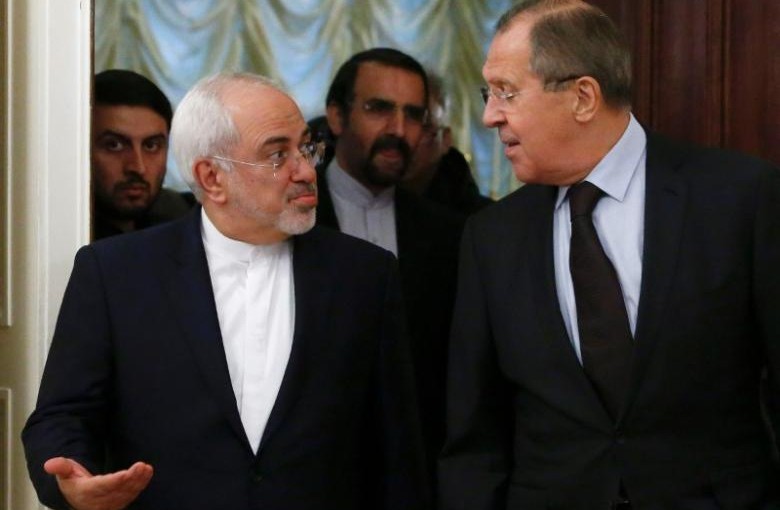 Russian Foreign Minister Sergei Lavrov (R) and his Iranian counterpart Mohammad Javad Zarif enter a hall during a meeting in Moscow, Russia, October 28, 2016. REUTERS/Sergei Karpukhin