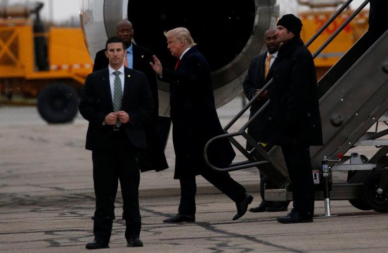 U.S. President-elect Donald Trump waves after arriving at John Glenn Columbus International Airport in Columbus, Ohio, U.S., December 8, 2016. REUTERS/Shannon Stapleton