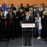 French Prime Minister Manuel Valls attends a news conference to announce that he is a candidate for January's Socialist presidential primary, as his wife Anne Gravoin (3rdL) looks on at the town hall in Evry, near Paris, France, December 5, 2016.  REUTERS/Christian Hartmann
