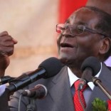 President of Zimbawe Robert Mugabe gestures as he addresses supporters of his ruling ZANU (PF) party at Harare International Airport, Zimbabwe, September 24, 2016. REUTERS/Philimon Bulawayo.
