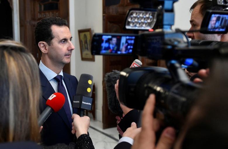 Syria's President Bashar al-Assad speaks to French journalists in Damascus, Syria, in this handout picture provided by SANA on January 9, 2017. SANA/Handout via REUTERS