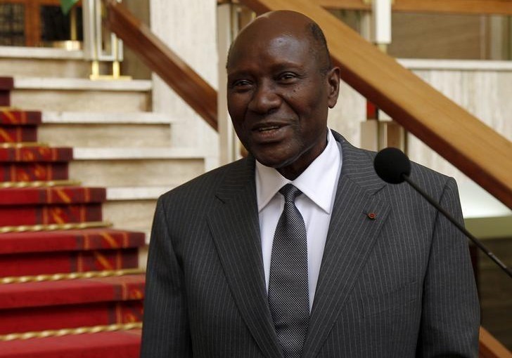 Ivory Coast Prime Minister Daniel Kablan Duncan smiles after the annoucement of the new government at the presidential palace in Abidjan January 12, 2016.  REUTERS/Luc Gnago