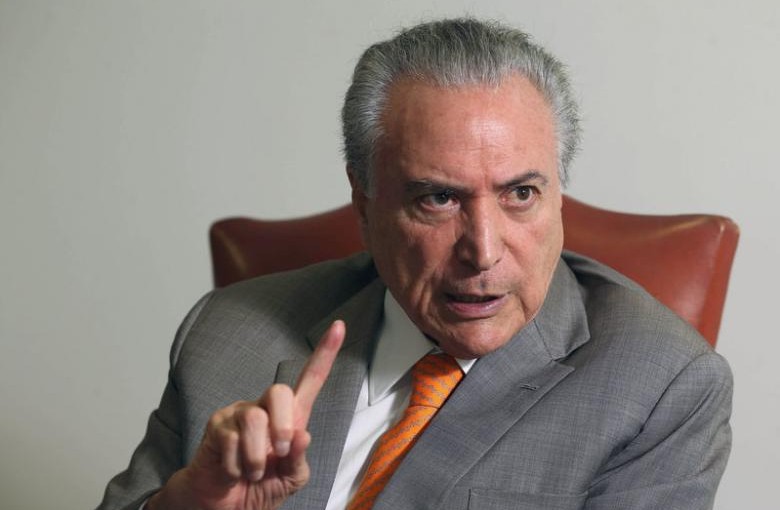 Brazil's President Michel Temer, gestures during an interview with Reuters at his office in Brasilia, Brazil, January 16, 2017. REUTERS/Adriano Machado