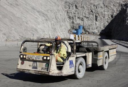 A worker drives a vehicle at Zimplats' Ngwarati Mine in Mhondoro-Ngezi May 30, 2014.    REUTERS/Philimon Bulawayo