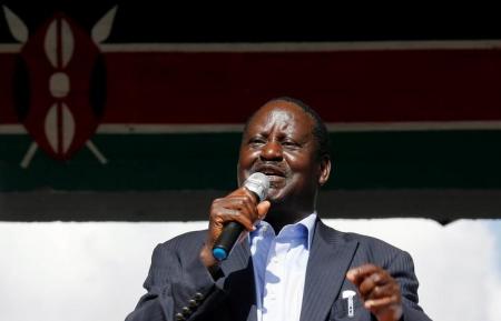 Kenyan opposition leader Raila Odinga addresses striking doctors at the Uhuru Park as they wait for the release of jailed officials of the national doctors' union following their case to demand fulfilment of a 2013 agreement between their union and the government that would raise their pay and improve working conditions, in Nairobi, Kenya February 15, 2017. REUTERS/Thomas Mukoya