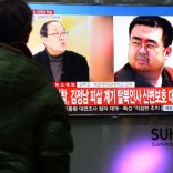 People watch a TV screen broadcasting a news report on the assassination of Kim Jong Nam, the older half brother of the North Korean leader Kim Jong Un, at a railway station in Seoul, South Korea, February 14, 2017.  Lim Se-young/News1 via REUTERS