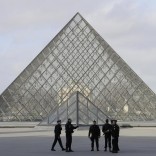 French police secure the site near the Louvre Pyramid in Paris, France, February 3, 2017 after a French soldier shot and wounded a man armed with a knife after he tried to enter the Louvre museum in central Paris carrying a suitcase, police sources said.  REUTERS/Christian Hartmann