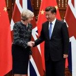 FILE PHOTO: Chinese President Xi Jinping (R) shakes hand with British Prime Minister Theresa May before their meeting at the West Lake State House on the sidelines of the G20 Summit, in Hangzhou, Zhejiang province, China, September 5, 2016. REUTERS/Etienne Oliveau/Pool/File Photo