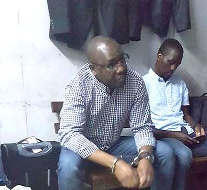 This Flag pastor Evan Mawarire in handcuffs after he was arrested at Harare International Airport.
Picture: Supplied