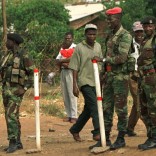 HAR02:ZIMBABWE-STRIKE:HARARE,11NOV98 - Soldiers of the Zimbabwe National Army patrols the high density suburb of Glen View in the capital November 11. The army are on patrol to prevent violence during the national one-day labour strike protesting the recent price increases fuel and commodities. hb/Photo by Howard Burditt REUTERS