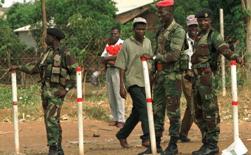 HAR02:ZIMBABWE-STRIKE:HARARE,11NOV98 - Soldiers of the Zimbabwe National Army patrols the high density suburb of Glen View in the capital November 11. The army are on patrol to prevent violence during the national one-day labour strike protesting the recent price increases fuel and commodities. hb/Photo by Howard Burditt REUTERS