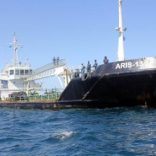 Maritime police are seen aboard oil tanker Aris-13, which was released by pirates, as it sails to dock on the shores of the Gulf of Aden in the city of Bosasso, northern Somalia's semi-autonomous region of Puntland, March 19, 2017. REUTERS/Abdiqani Hassan