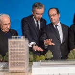 (L to R) U.S. architect Franck Gehry, LVMH CEO Bernard Arnault, French President Francois Hollande and Paris Mayor Anne Hidalgo watch a model af a new architectural project lead by LVMH in the 'Bois de Boulogne' in Paris, France, March 8, 2017 with plans to renovate the disused public building of the Musee National des Arts et Traditions Populaires.  REUTERS/Christophe Petit Tesson/Pool