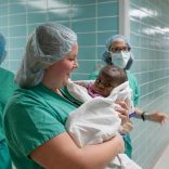Hospital staff carry 10-month old "Baby Dominique" into surgery to treat the infant born with four legs and two spines at Advocate Children's Hospital in Park Ridge, Illinois, U.S., March 8, 2017.  Photo taken March 8, 2017.   Courtesy Advocate Chidren's Hospital/Handout via REUTERS